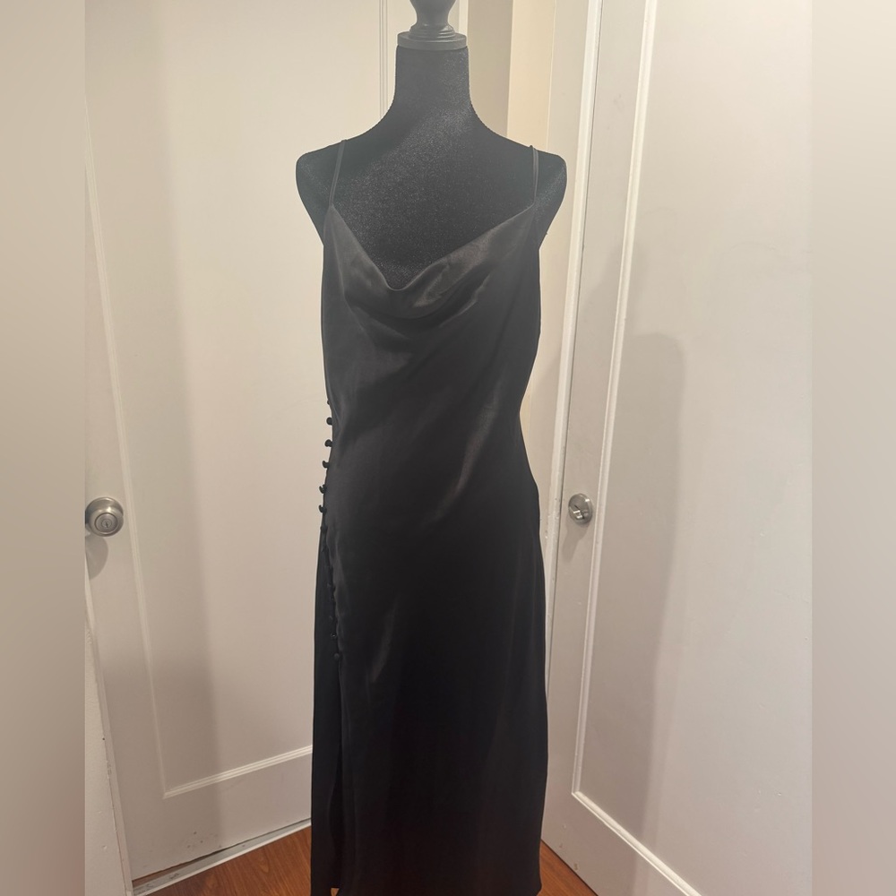 Black slip dress with side buttons